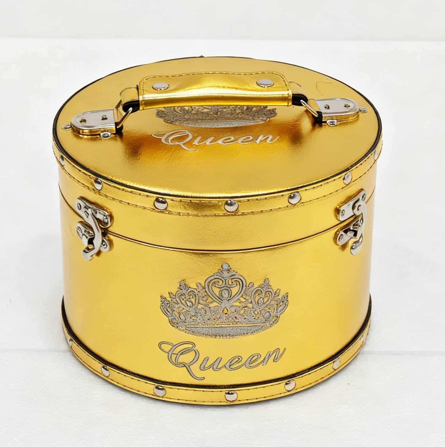 Gold foil crown case with metallic shine and Queen crown emblem
