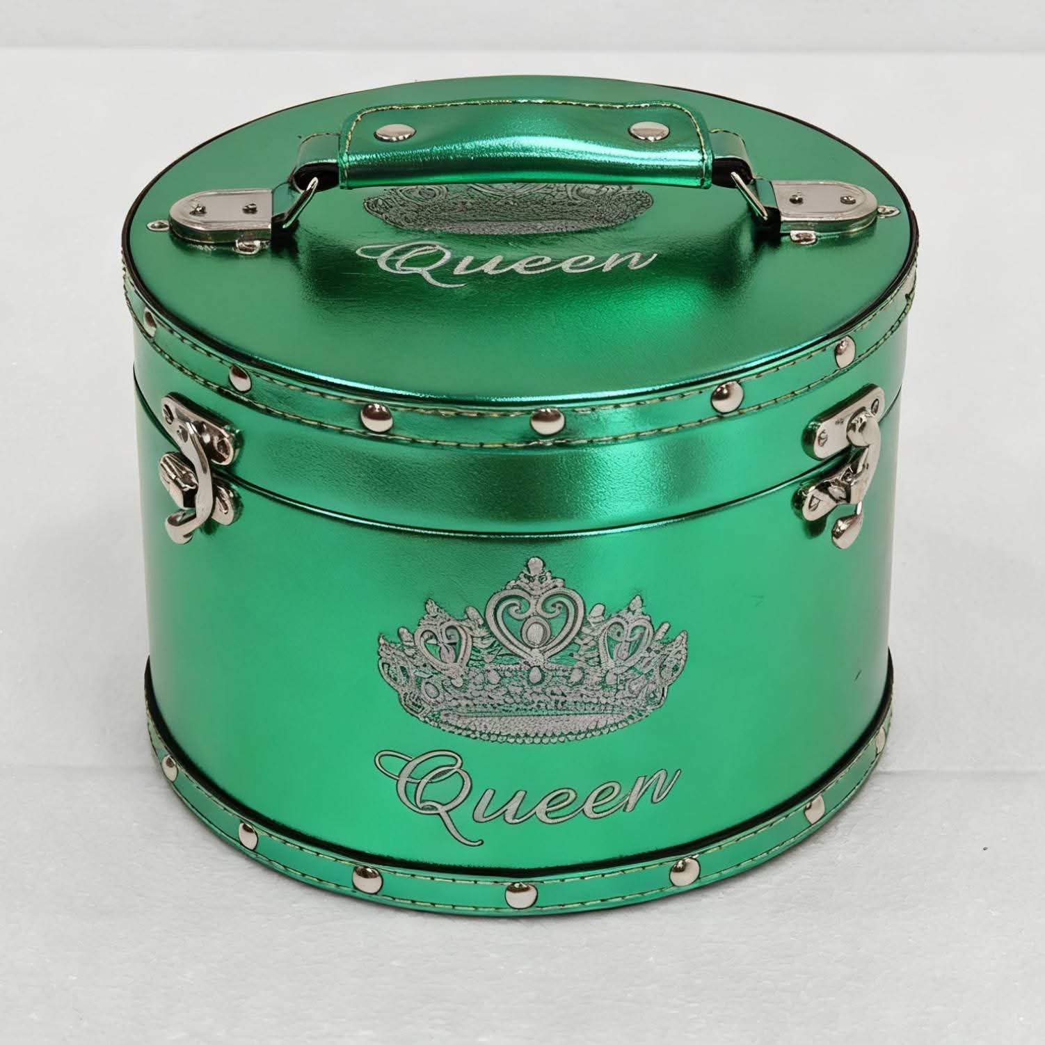 Green foil crown case with high-gloss finish and silver hardware
